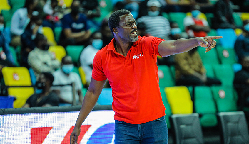 Rwanda Energy Group Basketball head coach Henry Mwinuka shouts instructions during a past match. The Kenyan coach is keen for his team to win the league title this season. Photo by Dan Nsengiyumva