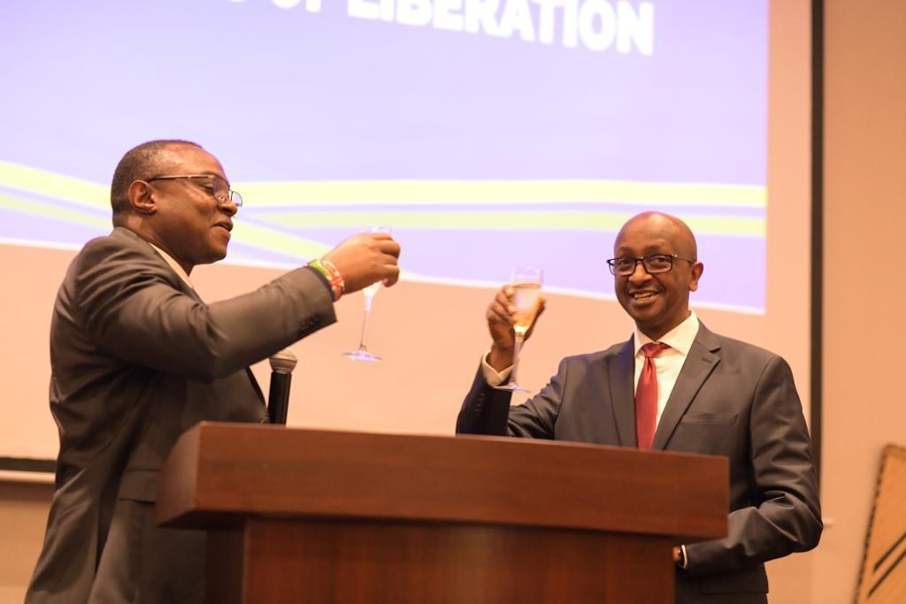 Rwandau2019s High Commissioner to Kenya Dr Richard Masozera sharing a toast with the Chief Guest, George Orina, the Director General for Multilateral Affairs, Kenyau2019s Ministry of Foreign Affairs