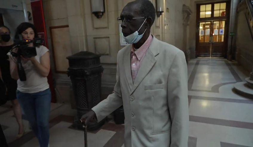 Bucyibaruta entering the French court for sentencing on Tuesday. He was immediately placed into custody after the ruling.