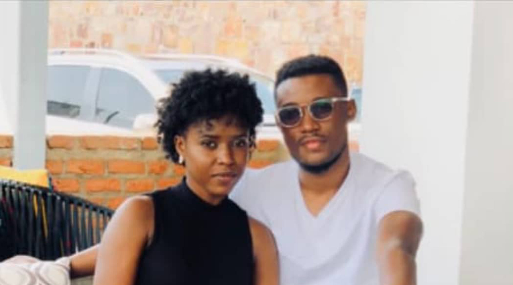Serge Iyamuremye and girlfriend in the US.