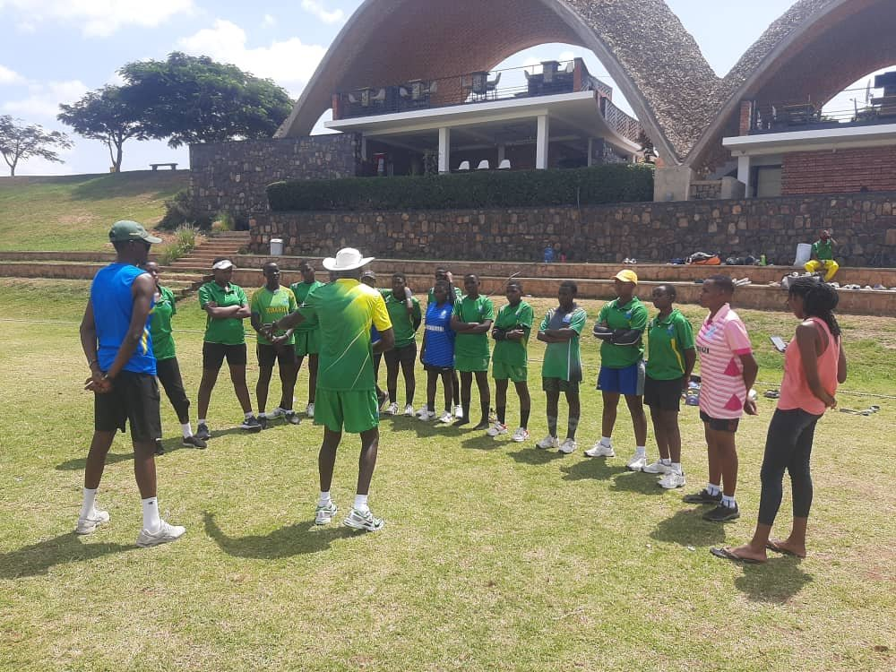 Leonard Nhamburo(r) talks to his players during a recent session as Rwanda prepares for teh  U-19 ICC World Cup Africa Qualifier in Botswana from September 1. Courtesy