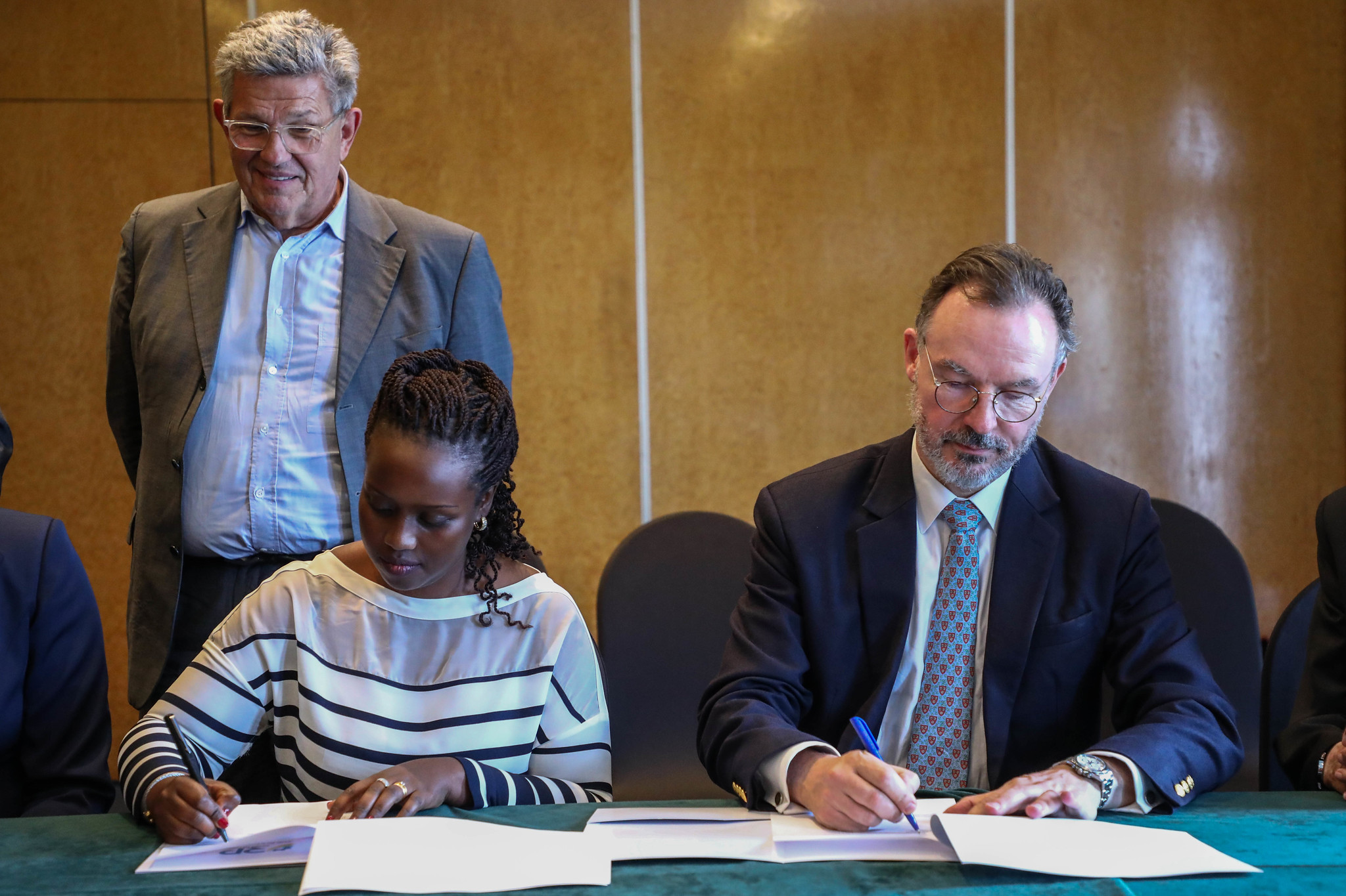 Sylvie Mucyo Vice-Chancellor at Rwanda Polytechnic, Matthias Afting Executive Director at COGNOS International sign the agreement in Kigali on July 19. Through the signed agreement Seeing Hands Rwanda will train visually impaired persons in massage therapy and breast cancer screening. Photos by Dan Nsengiyumva