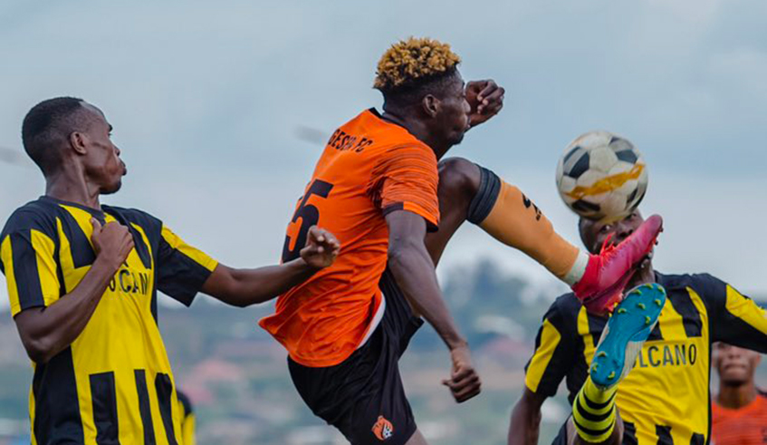 Sadick Sulley flies high to challenge for the ball against Mukura players during a league match at Nyamata Stadium last season. Photo: Courtesy.