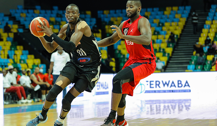Patriotsu2019 Dieudonne Ndizeye tries to get past REGu2019s Olivier Shyaka during a past match. Patriots take on UGB on Friday as they bid to finish second in the national basketball league. Photo: Dan Nsengiyumva.