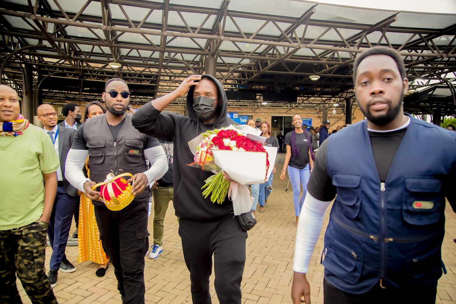The Ben(C) touches down at Kigali International Airport ahead of Saturday performance at the much-anticipated Rwanda Rebirth Celebration concert at BK Arena- Photos by Julien Sangwa
