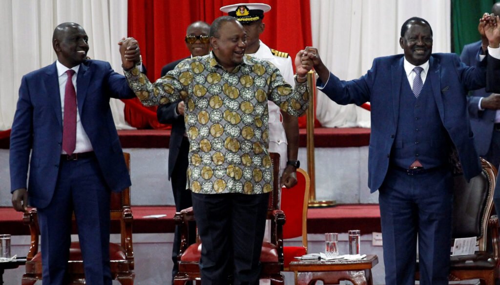 President Uhuru Kenyatta (middle) with the two frontrunners in the elections. On the left is his deputy William Ruto and Raila Odinga is on the right. Kenyatta has chosen to back Odinga to succeed him at the expense of his deputy.