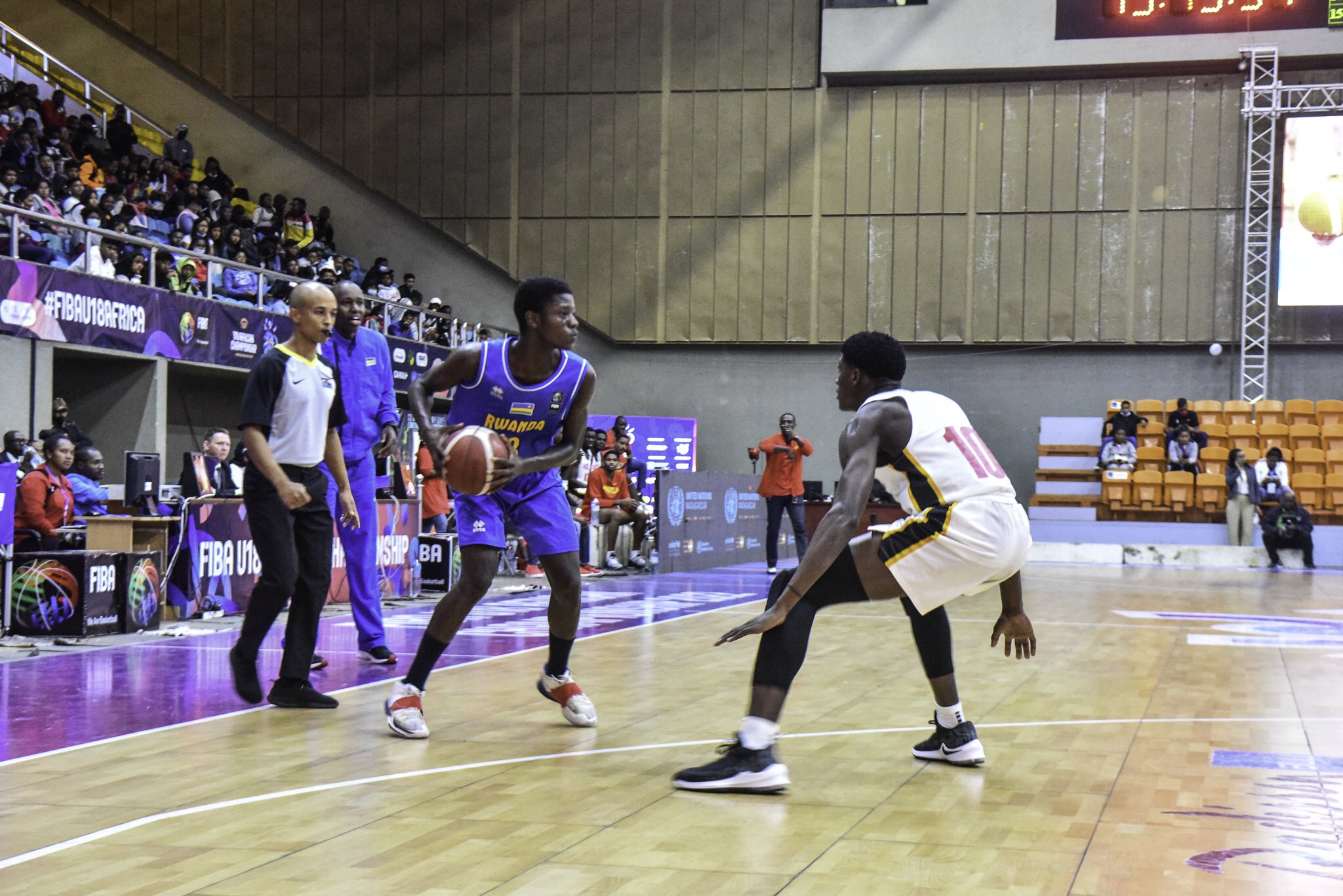 The Under-18 national basketball team during the game against Angola. The team finished the African Championships without registering a single win out of the four matches they played. Courtesy